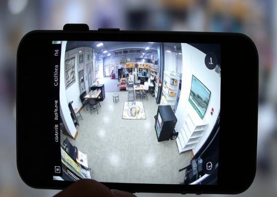 CCTV camera view displayed on an iPhone screen for easy monitoring.