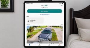 iPad displaying a smart home app for controlling security cameras, alarm system, smart locks, lighting, and home automation devices.