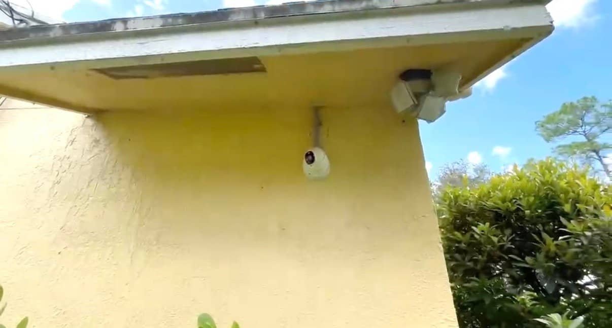 Palm Beach County security company installing a residential security camera