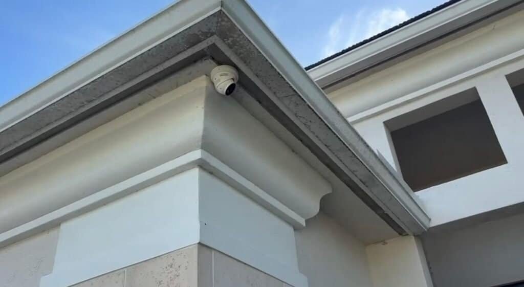 Security cameras Westlake FL: outdoor dome camera mounted under the eave of a home we installed